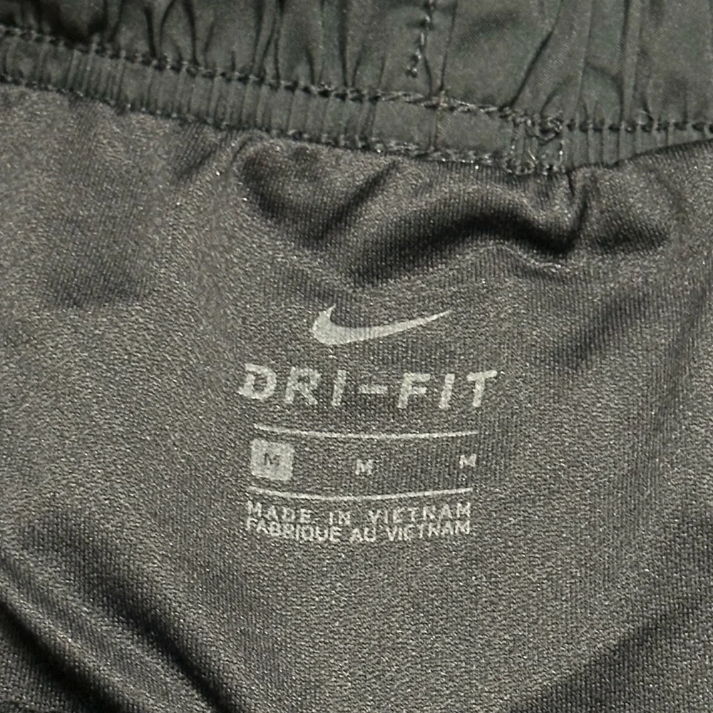 🛍️ Nike dri-fit black with white trimmed shorts great condition.